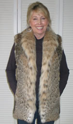 Original fur went from boxy and big with dolman sleeves to an updated vest with leather panels!