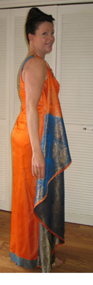 Beauty all around. The fit, the sari fabric, the design all flirting in harmony.